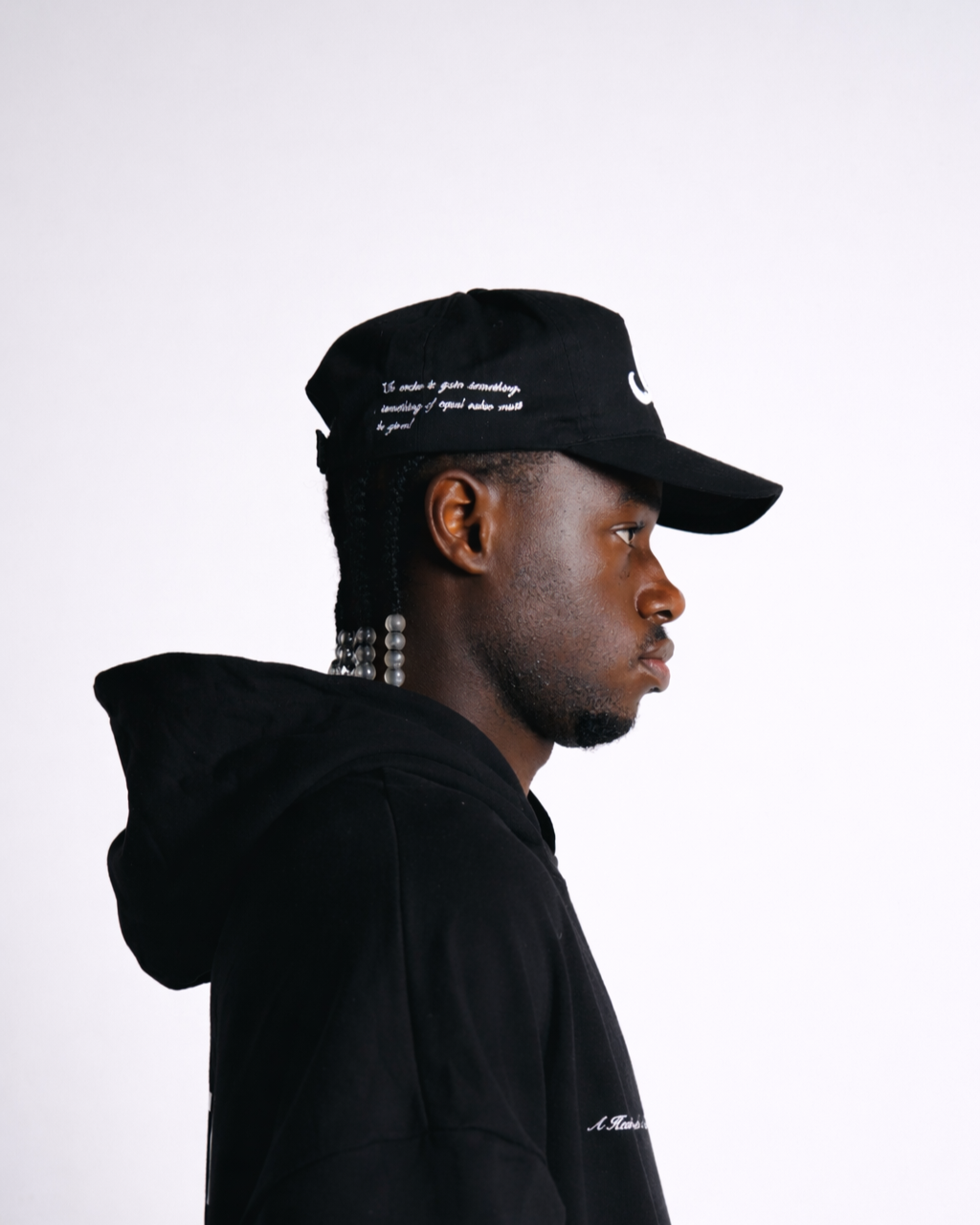 animate clo black cap side profile